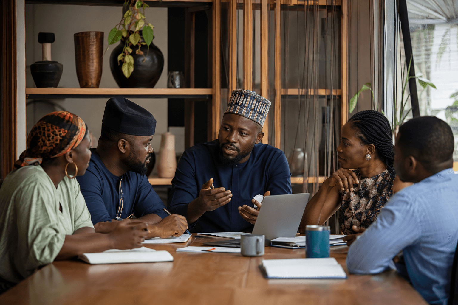 Nigerian professionals discussing a development programme